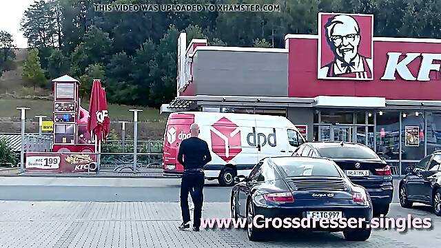 Gummipuppe Monique crossdresser with female mask in pub