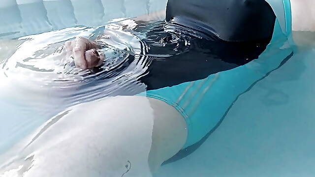 Shemale in sexy one piece swimsuit jerking in jaccuzzi