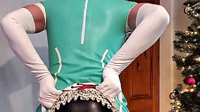 Fetish Nurse - Mint green latex dress, whitered seamed stockings, latex underwear and long white latex gloves.